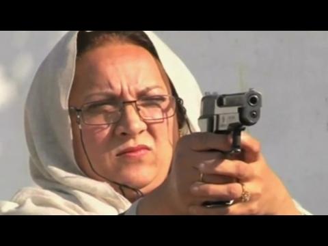 Teachers learn to shoot after Peshawar school attack