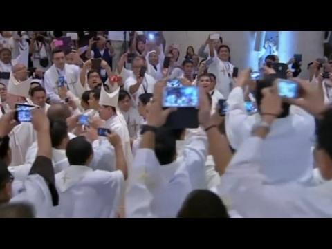 Applause erupts as Pope Francis asks "Do you love me?" at Philippine mass