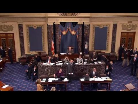 Bitter partisanship before U.S. Senate passes major spending bill