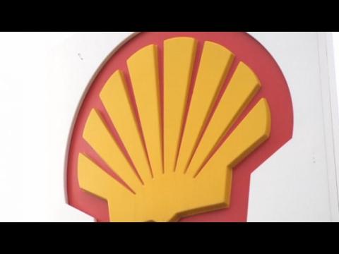 Shell shares fall on spending cut