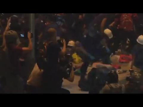 Hong Kong protesters clash with police near financial district