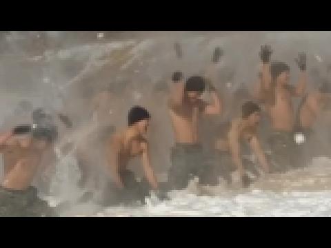 Shirtless South Korean soldiers brave bitter cold in military drill