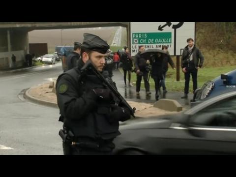 French police close in on newspaper killing suspects