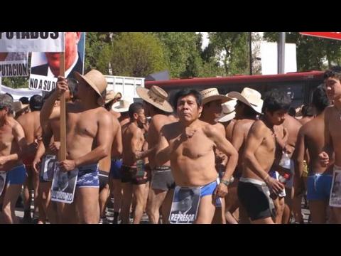 Hundreds of  naked farmers protest for their rights
