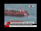 Tail of crashed AirAsia flight recovered