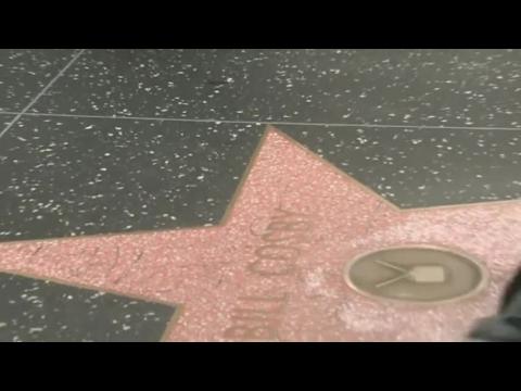 Swift, Smith get Grammy nods; Cosby's Walk of Fame star defaced