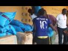 Island residents of Sierre Leone receive food aid