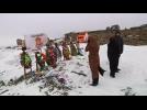 Ukrainians bury time capsule at destroyed war memorial