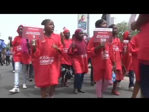 Children march in Nigeria on the first anniversary of Chibok girls' mass kidnapping