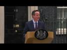 UK's Cameron promises EU vote, greater Great Britain