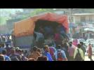 Exodus from Kathmandu as aftershocks rattle following deadly quake