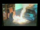 Video shows woman setting gas pump on fire