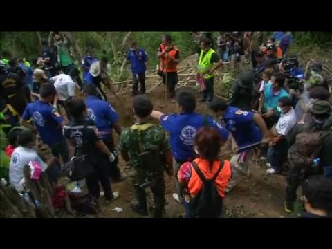 Twenty-six bodies exhumed from Thai mass grave