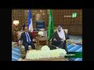 French President Hollande arrives in Saudi Arabia, meets King Salman