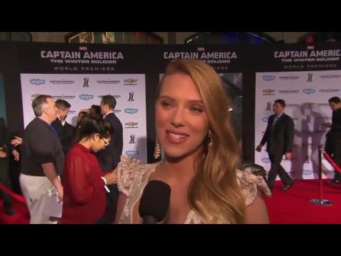 A Sexy Scarlett Johansson Shows Off New Baby Bump At Premiere