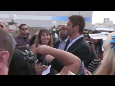 Gerard Butler Poses With A Shirtless Sexy Guy and Talks With Fans
