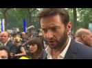 Hugh Jackman Makes A Big Splash At "The Wolverine" London Premiere