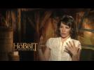 Evangeline Lilly Likes Having A lot Of Guys Paying Attention To her