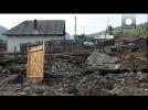 Clean-up begins in Romania after deadly floods