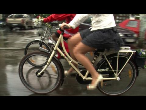 Romanian women promote bike riding in skirts
