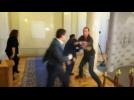 Ukrainian deputies fight outside of parliament chamber