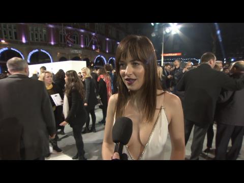 Dakota Johnson Stuns In Sexy Plunging Gown At London Premiere