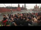 Thousands of stunned Russians mourn slain opposition figure