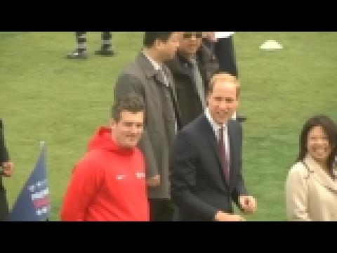 Prince William watches soccer training at a Shanghai high school