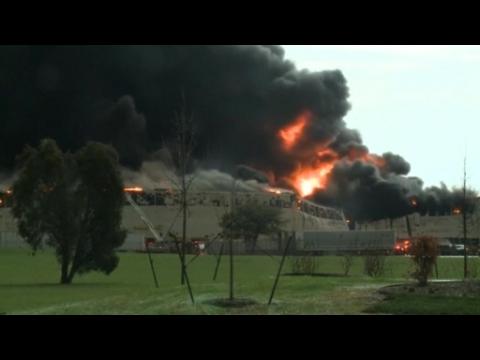 Firefighters battle massive blaze at GE facility