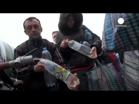 Heavy shelling in eastern Ukraine forces civilians to flee