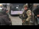Ukrainian authorities, rebels evacuate civilians from front line town