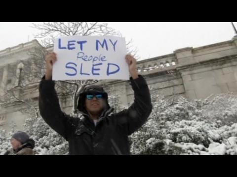 Sledding on Capitol Hill despite ban by police