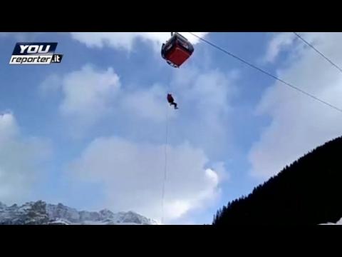 Hundreds of skiers rescued from cable car after high winds hit Italian Dolomites