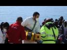 More migrants rescued by Italian coast guard arrive in Sicily