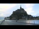 High tide brings onlookers to Mont-Saint-Michel landmark