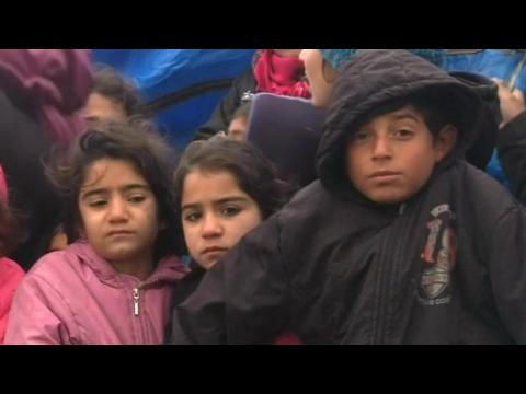 Syrians return to Kobani after Kurds win back border town