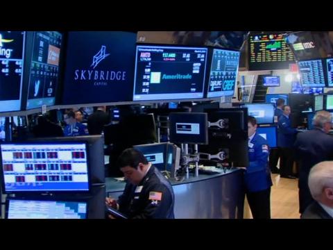 Wall Street rebounds on deal activity