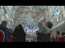 Pope Francis meets homeless on private visit to Sistine Chapel