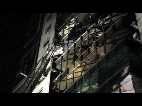 Bangladeshi firefighters comb blaze-hit high-rise