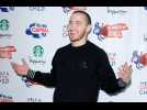 Mike Posner stays silent to preserve voice