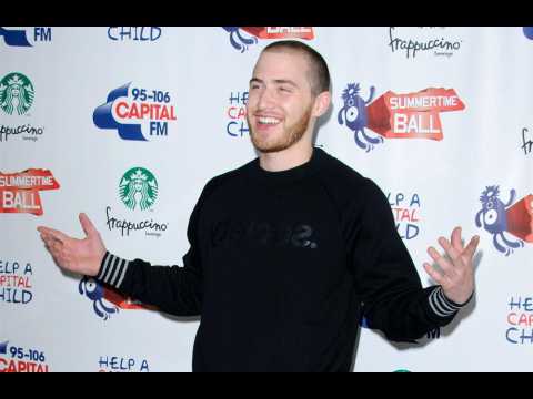 Mike Posner stays silent to preserve voice