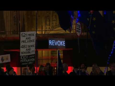 Protesters wait outside Parliament ahead of Brexit plan votes