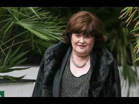 Susan Boyle takes flying lessons