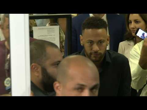 Neymar leaves a police station in Rio de Janeiro