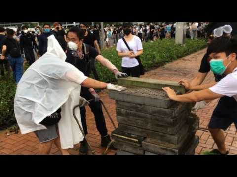 Hong Kong protesters prepare barriacdes near government offices