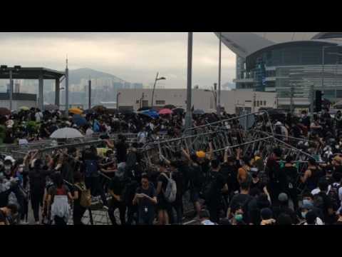 Anti-government protesters block main arteries in Hong Kong