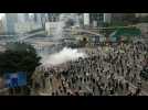 Clashes escalate between police and protesters in Hong Kong
