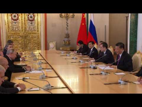 China's Xi Jinping holds talks with Vladimir Putin in Moscow
