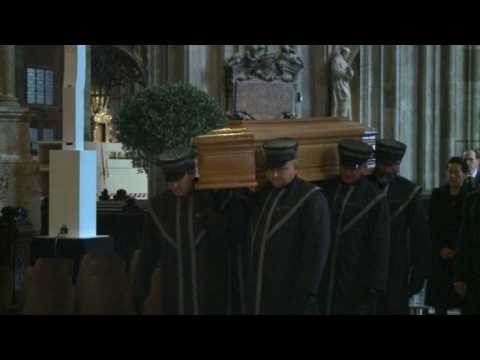F1 legend Niki Lauda's coffin carried inside Vienna cathedral