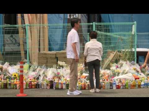 Japanese pay tribute to victims of mass stabbing